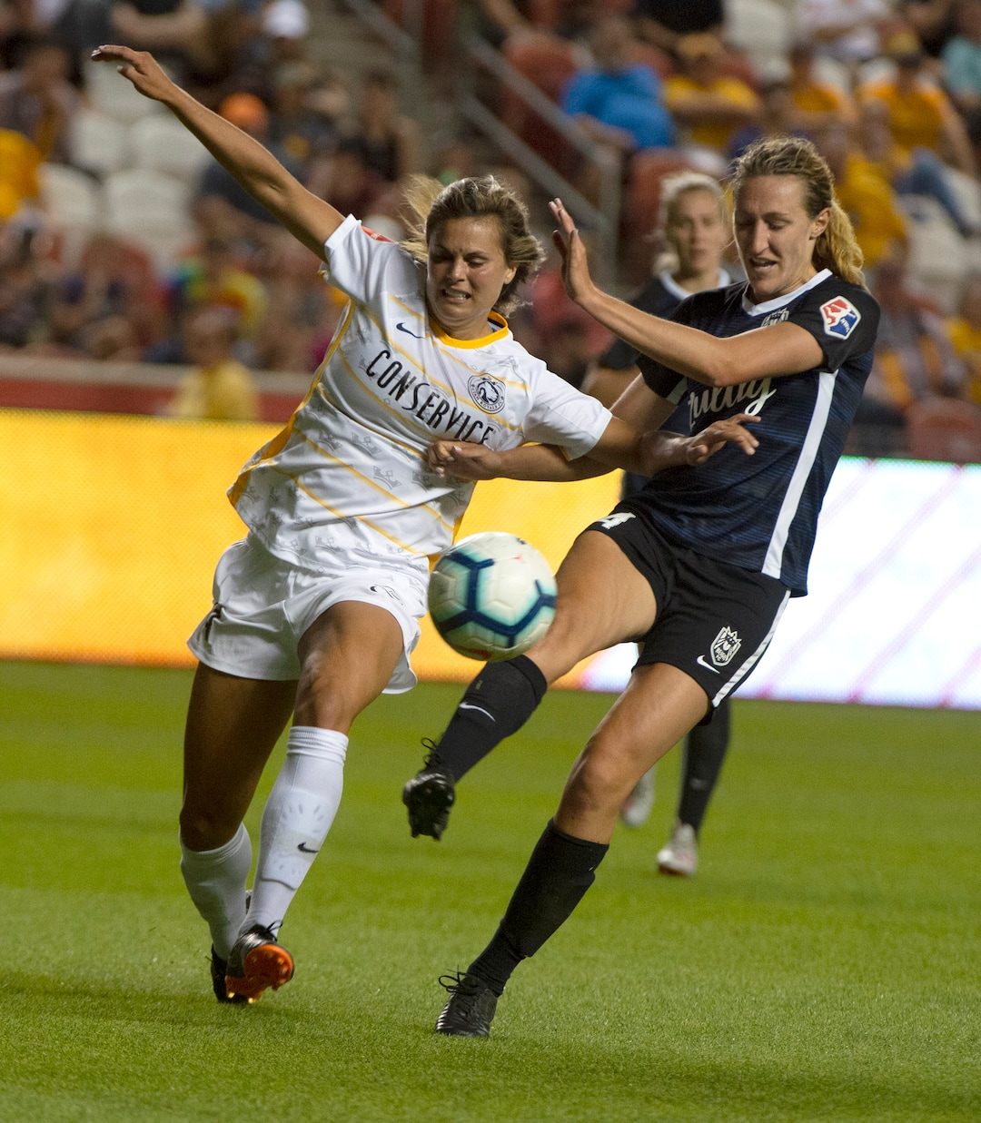 (Rick Egan  |  The Salt Lake Tribune)   Utah Utah Royals FC forward Katie Stengel (24) collides with Seattle Reign FC midfielder Morgan Proffitt (14), as the Royal fall to the Reign 0-2, in soccer action between Utah Royals FC and Seattle Reign FC in Sandy, Friday, June 28, 2019.