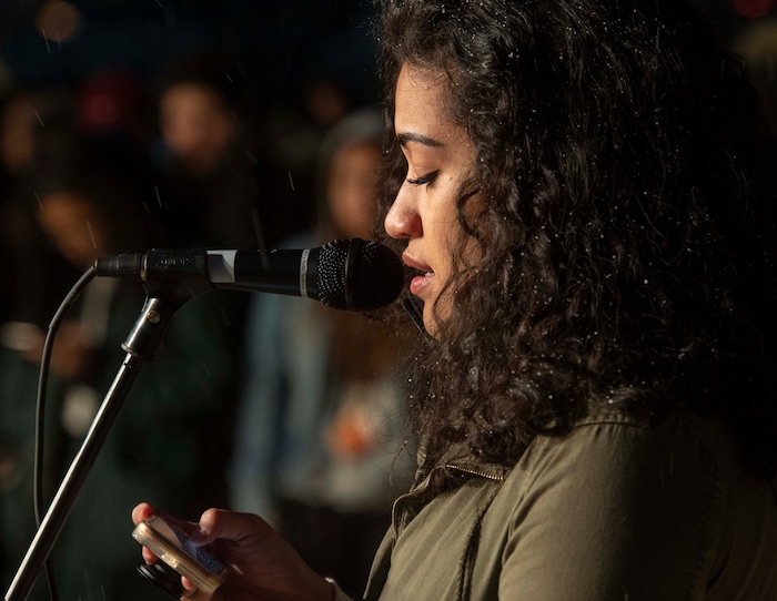 (Rick Egan  |  The Salt Lake Tribune)      Losa Smith, president of the BYU Women of Color club, sings “Abide with Me, ‘Tis Eventide” during a candlelight vigil on BYU campus, for the student who died by suicide this week, at the Tanner Building, Friday, Dec. 7, 2018.