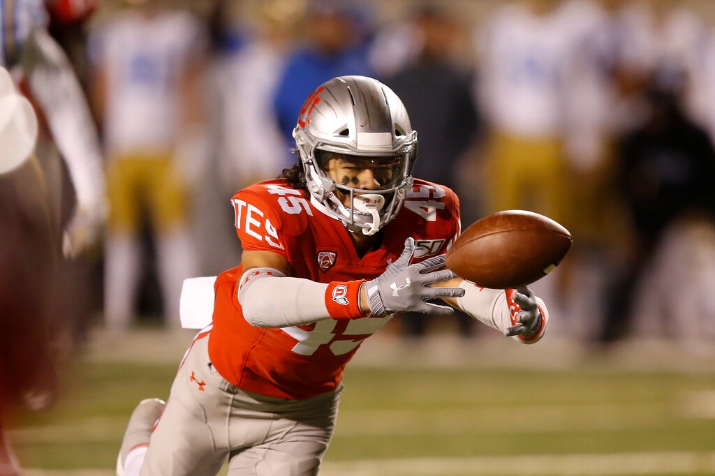 (Rick Bowmer | AP) Utah wide receiver Samson Nacua (45) reaches for a pass against UCLA in the first half during an NCAA college football game Saturday, Nov. 16, 2019, in Salt Lake City.
