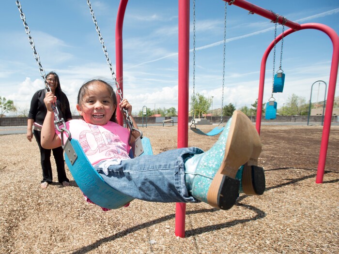 (Rick Egan  |  Tribune File Photo)  Laurel Yellowhorse plays with her 3-year-old daughter RaeLynn, at the playground near the Paiute Tribal office in Cedar City, Wednesday, May 6, 2015.