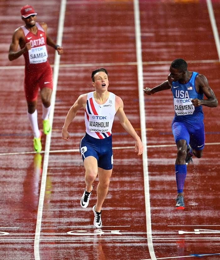 Norway's Karsten Warholm crosses the finish line ahead of third placed United States' Kerron Clement, right, to win the Men's 400 meters hurdles final at the World Athletics Championships in London Wednesday, Aug. 9, 2017. (AP Photo/Martin Meissner)