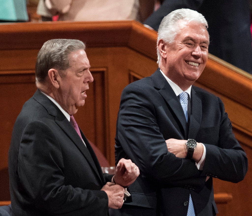 (Rick Egan  |  The Salt Lake Tribune) Apostles Jeffrey R. Holland and Dieter Uchtdorf chat before a General Conference session in 2018. With Holland's recent death, Uchtdorf is now second in line to lead the church.