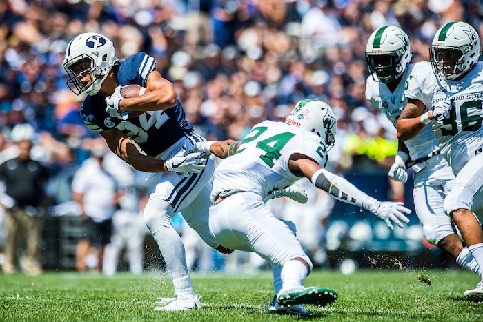 (Chris Detrick  |  The Salt Lake Tribune)  Brigham Young Cougars wide receiver Neil Pau'u (84) runs for a touchdown past Portland State Vikings cornerback Artuz Manning (24) during the game at LaVell Edwards Stadium Saturday, August 26, 2017.