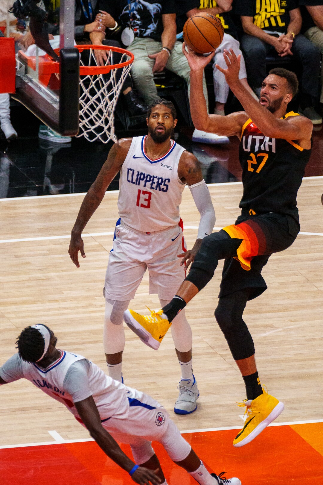 (Trent Nelson  |  The Salt Lake Tribune) Utah Jazz center Rudy Gobert (27) shoots as LA Clippers guard Reggie Jackson (1) falls, as the Utah Jazz host the Los Angeles Clippers in a Game 5 matchup, NBA basketball in Salt Lake City on Wednesday, June 16, 2021.