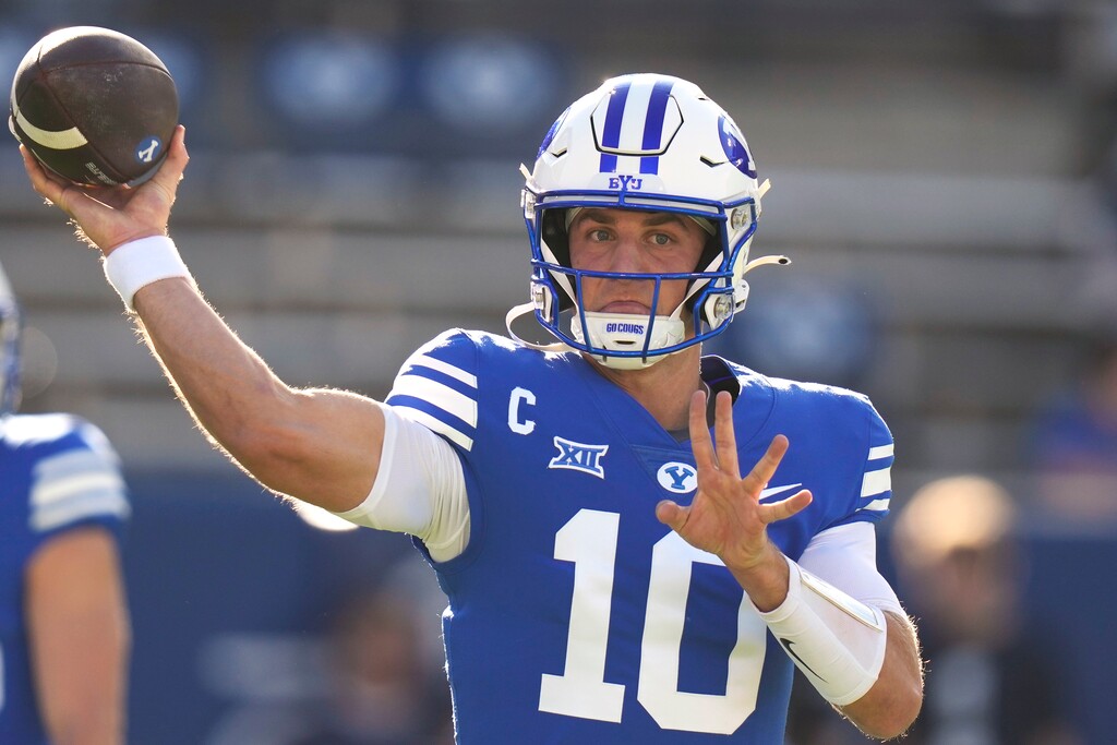 BYU quarterback Kedon Slovis (10) warms up before the start of an NCAA college football game against Texas Tech Saturday, Oct. 21, 2023, in Provo, Utah. (AP Photo/Rick Bowmer)