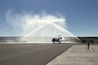 (Andrew Christiansen | The Times-Independent) Fire trucks welcome the inaugural SkyWest-operated Delta Connection flight from Salt Lake City with a water salute Oct. 1 at Canyonlands Regional Airport.