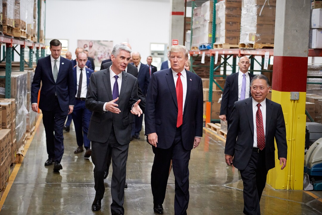 (Courtesy of LDS Church)  Bishop Grald Causs of the Presiding Bishopric speaks with President Donald J. Trump at Welfare Square.