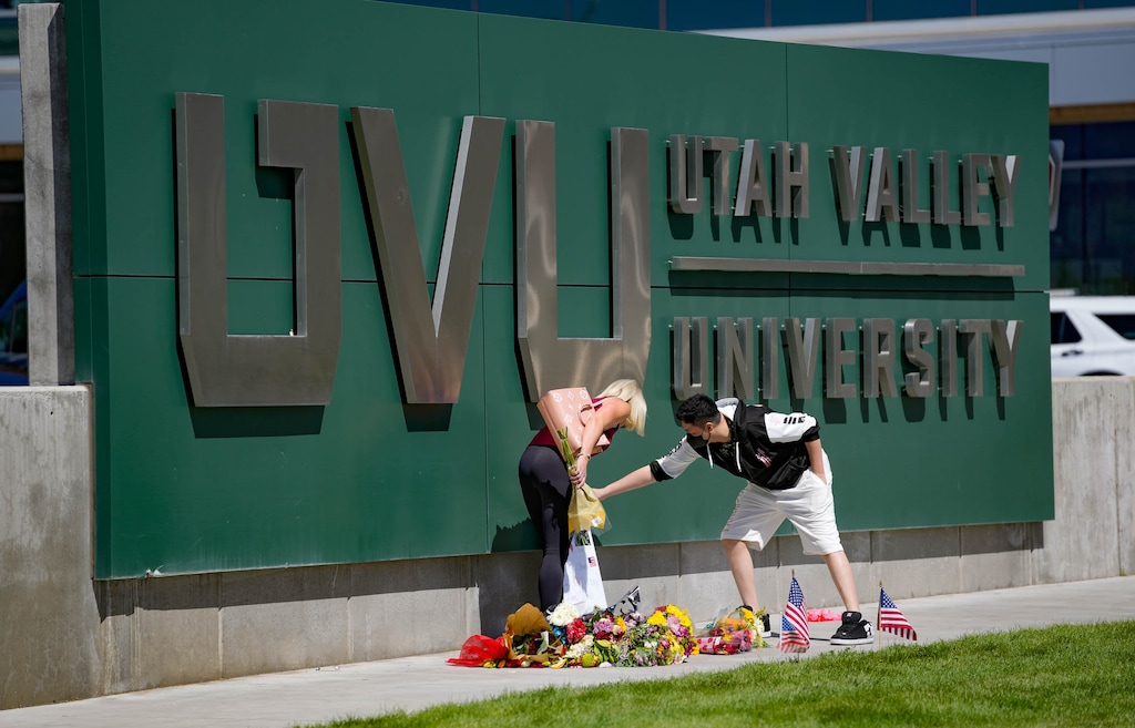 (Francisco Kjolseth | The Salt Lake Tribune) People try to leave flowers at the sign for Utah Valley University before being dissuaded by law enforcement after the shooting death of Charlie Kirk during a speaking event at the university the day before. Students, experts say, are likely to be processing the trauma of the day for years to come.
