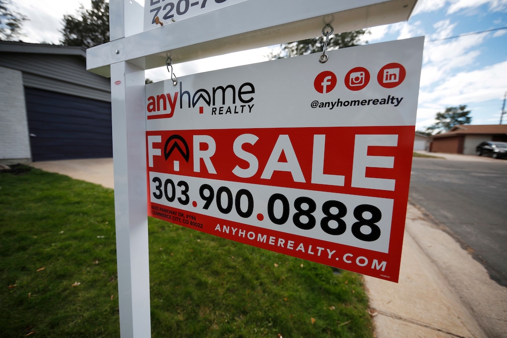 (David Zalubowski | The Associated Press) In this Oct 2, 2018, file photo a for sale sign stands outside a home on the market in the north Denver suburb of Thornton, Colo. On Tuesday, Nov. 27, the Standard & Poor's/Case-Shiller 20-city home price index for September is released.