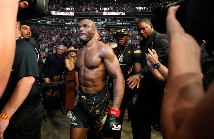 (Francisco Kjolseth | The Salt Lake Tribune) Nigerian UFC fighter Kamaru Usman walks out of the arena after being knocked out by UFC fighter Leon Edwards, of Jamaica, during the welterweight UFC 278 mixed martial arts title bout in Salt Lake City on Saturday, Aug. 20, 2022.