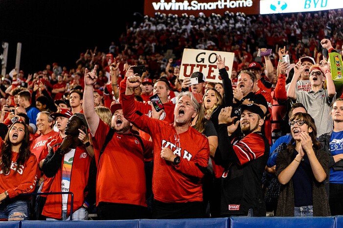 (Trent Nelson | The Salt Lake Tribune) Utah fans celebrate the win as BYU hosts Utah, NCAA football in Provo, Saturday September 9, 2017.