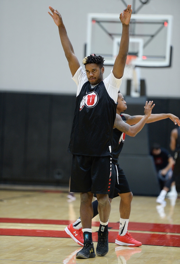 (Francisco Kjolseth  |  The Salt Lake Tribune)  Christian Popoola throws his hands up after a basket as the Utah men's basketball program begins fall practices with a fairly new roster of players on Friday, Sept. 29, 2017.