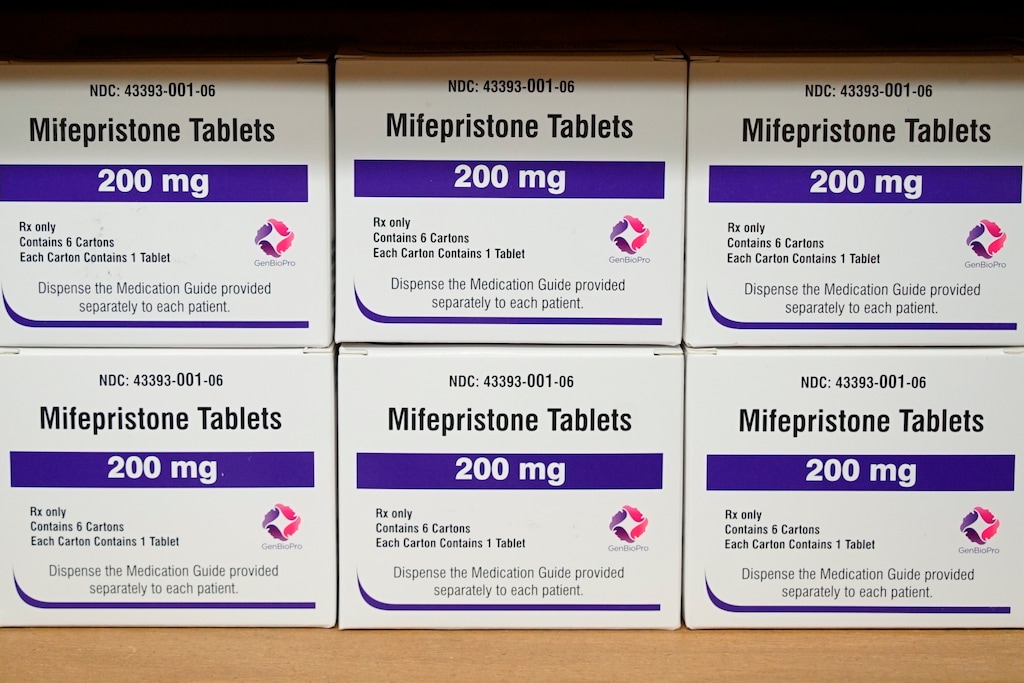 FILE - Boxes of the drug mifepristone sit on a shelf at the West Alabama Women's Center in Tuscaloosa, Ala., on March 16, 2022. Oregon Gov. (AP Photo/Allen G. Breed, File)
