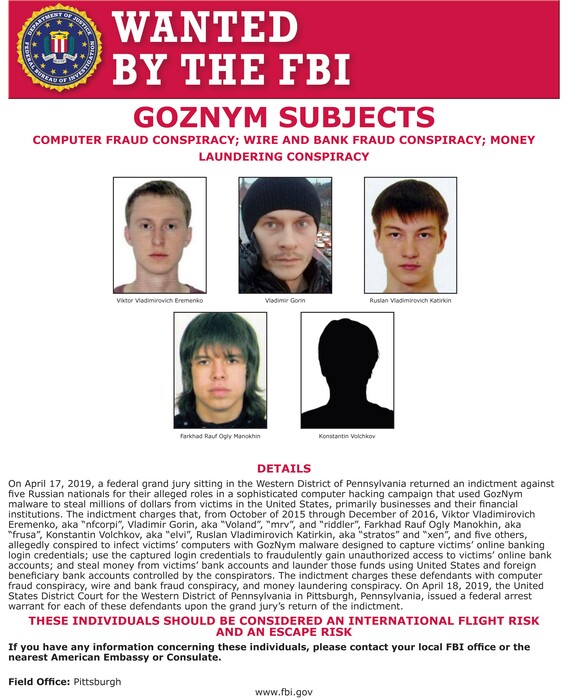 (FBI Pittsburgh Field Office via AP) This undated poster released by the FBI includes five Russian fugitives that have been charged in connection with malicious software attacks that infected tens of thousands of computers worldwide and caused more than $100 million in financial losses.