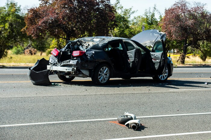 (Chris Detrick  |  The Salt Lake Tribune)  The scene of a plane crash at 1900 West and 4500 South in Roy Tuesday, September 12, 2017. The pilot of a single-engine airplane survived a fiery crash on a street in Roy Tuesday afternoon, authorities said. Roy police Sgt. Matthew Gwynn said the pilot was transported to a hospital “out of precaution,” as was the driver of a car that the plane hit.