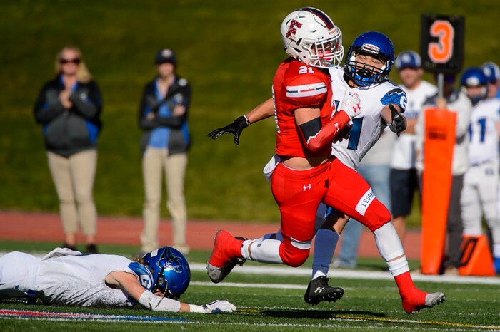 (Trent Nelson | The Salt Lake Tribune)
East's Charlie Vincent (21) runs for a touchdown as East hosts Pleasant Grove in the first round of the 6A high school football playoffs, Friday Oct. 26, 2018.