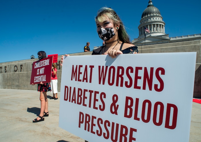 (Rick Egan | The Salt Lake Tribune) Ylee Greene joins a protest at the State Capitol as the Physicians Committee for Responsible Medicine is asking Gov. Herbert to close meatpacking plants in the state to slow the spread of the coronavirus, Thursday, July 30, 2020.
