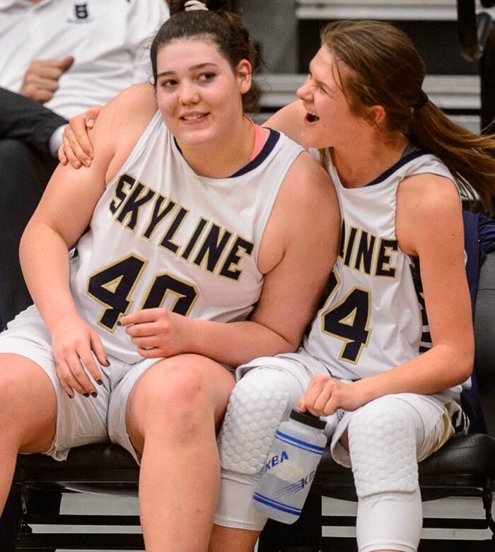 (Trent Nelson | The Salt Lake Tribune)  Skyline's Cameron Mooney (40) and Skyline's Kate Vorwaller (24) celebrate as Skyline faces Springville in the 5A High School Girls' Basketball Tournament at SLCC in Taylorsville, Wednesday Feb. 21, 2018.