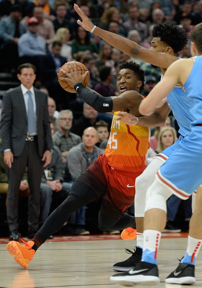 (Francisco Kjolseth  |  The Salt Lake Tribune)  Utah Jazz guard Donovan Mitchell (45) pushes past the Kings in the NBA game at Vivint Smart Home Arena Wed., Nov. 21, 2018, in Salt Lake City.
