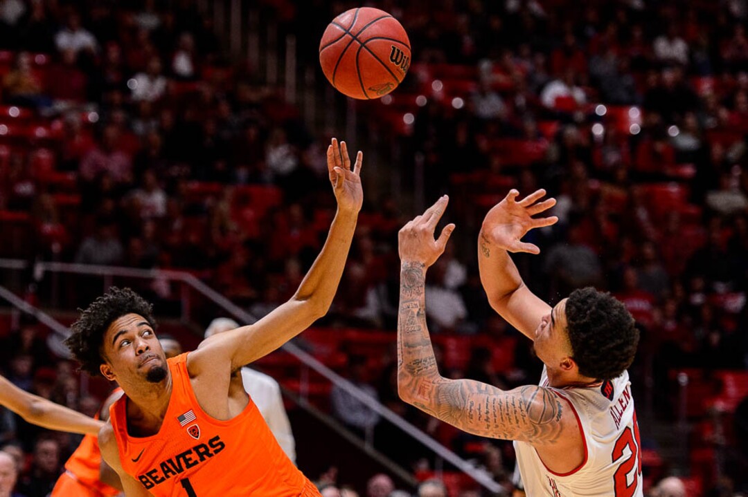 (Trent Nelson | The Salt Lake Tribune)  Oregon State Beavers guard Stephen Thompson Jr. (1) and Utah Utes forward Timmy Allen (20) as Utah hosts Oregon State, NCAA basketball in Salt Lake City on Saturday Feb. 2, 2019.