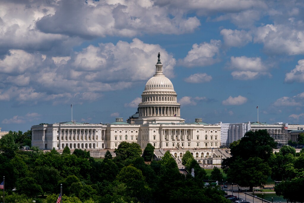 (J. Scott Applewhite | AP file photo) In this June 20 photo, the Capitol is seen from the roof of the Canadian Embassy in Washington.