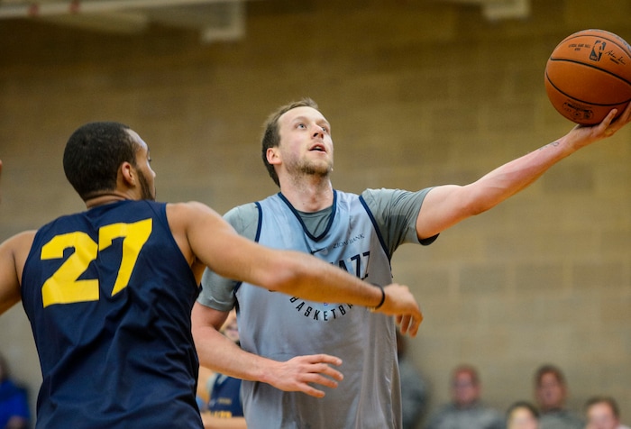 (Steve Griffin  |  The Salt Lake Tribune)    Utah Jazz forward Joe Ingles scoops up a basket as the Jazz scrimmage in the Warrior Fitness Center on Hill Air Force Base as a part of a "Hoops for Troops" promotion Ogden Friday September 29, 2017. It's also Utah's first public scrimmage of the season, and the first look at how the new pieces of the team will work together. 