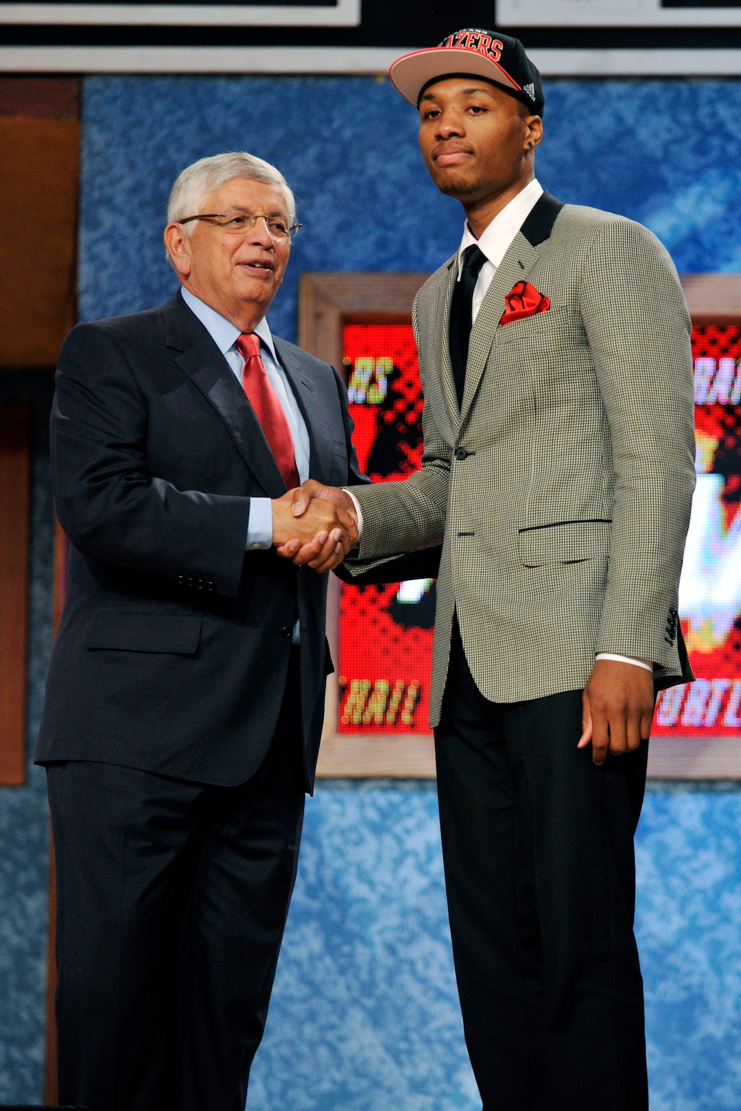 (Bill Kostroun  |  AP file photo)  NBA Commissioner David Stern, left, poses with the No. 6 overall draft pick Damian Lillard, of Weber State, who was selected by the Portland Trail Blazers in the 2012 NBA basketball draft.