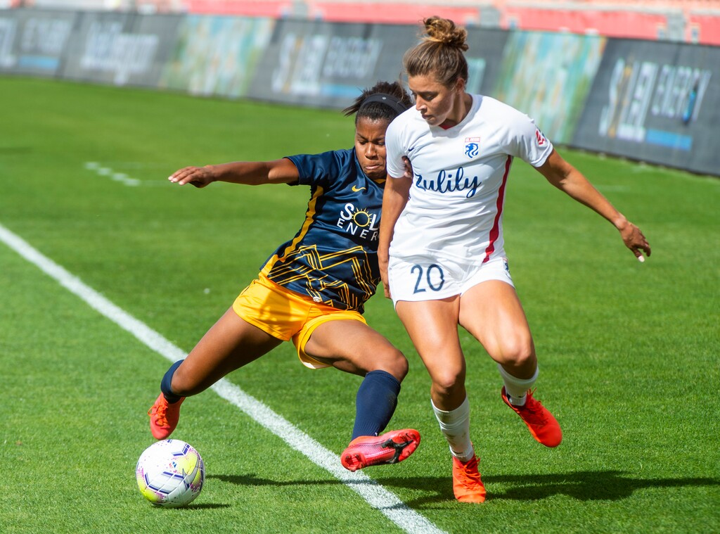 (Rick Egan  |  The Salt Lake Tribune) Utah Royals FC midfielder  Elizabeth Ball (7) goes for the ball along with OL Reign FC attacker SofiaHuerta, in soccer action between Utah Royals FC and Ol Reign FC at Rio Tinto Stadium in Sandy, Saturday, Sept. 26, 2020.