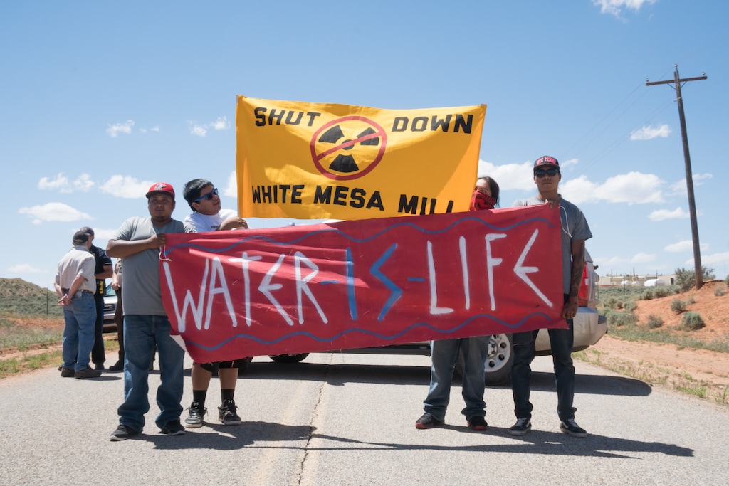 (Corey Robinson | Tribune file photo) Protesters from White Mesa, Utah, march against the White Mesa Mill, the last conventional uranium mill still operating in the U.S. May 14, 2017.