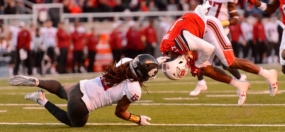 (Trent Nelson | The Salt Lake Tribune)  Utah Utes wide receiver Demari Simpkins (17) is brought down by Washington State Cougars linebacker Jahad Woods (13) as the University of Utah hosts Washington State, NCAA football in Salt Lake City, Saturday November 11, 2017.