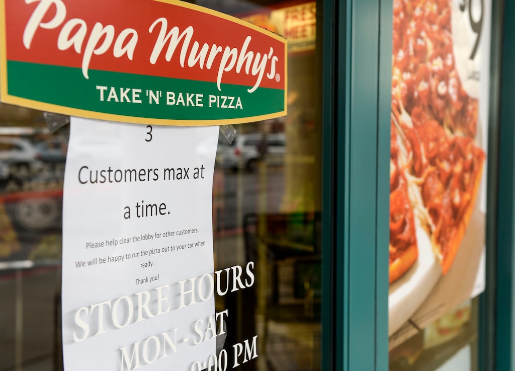 (Leah Hogsten  |  The Salt Lake Tribune) Papa Murphy's alerts customers to the allowable number inside the store, March 24, 2020 in Ogden.