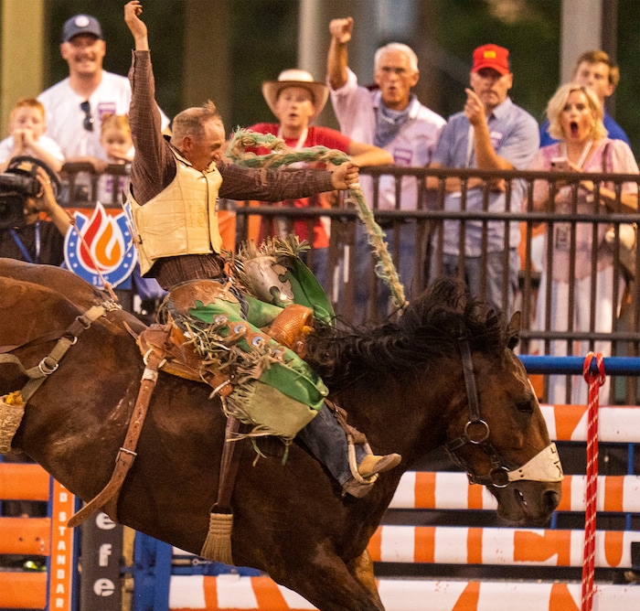 (Rick Egan | The Salt Lake Tribune)  Alan Boore competes in saddle bronc at the Utah Days of '47 Rodeo at the State Fairpark, on Monday, July 25, 2022.
