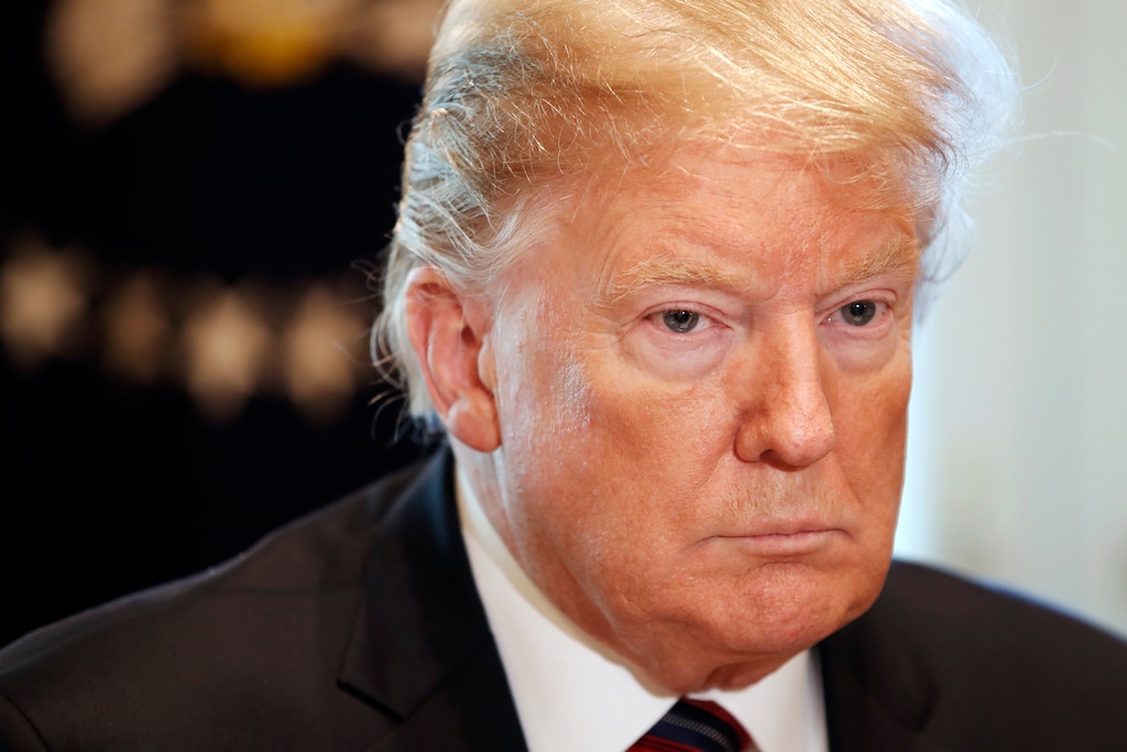 (AP Photo/Jacquelyn Martin) President Donald Trump attends a roundtable discussion on border security with local leaders, Friday Jan. 11, 2019, in the Cabinet Room of the White House in Washington.