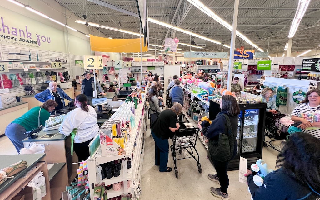 (Bethany Baker  |  The Salt Lake Tribune) Dozens of people stand in line at JOANN Fabric and Crafts in Draper on Tuesday, Feb. 25, 2025 after the retailer announced it will be closing all 800 retail stores and going out of business. 