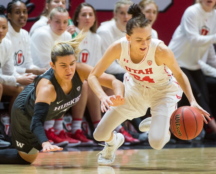 (Rick Egan  |  The Salt Lake Tribune)       Washington Huskies guard Amber Melgoza (4) goes for a loose ball along with Utah Utes guard/forward Tilar Clark (24), in PAC-12 women's basketball action at the Jon M. Huntsman Center, Sunday, Feb. 18, 2018.