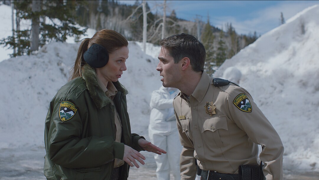 (Photo courtesy of Orion Classics) Deputies Julia Robson (Riki Lindhome, left) and John Marshall (Jim Cummings) deal with a bloody murder scene, in the filmed-in-Utah horror thriller "The Wolf of Snow Hollow."