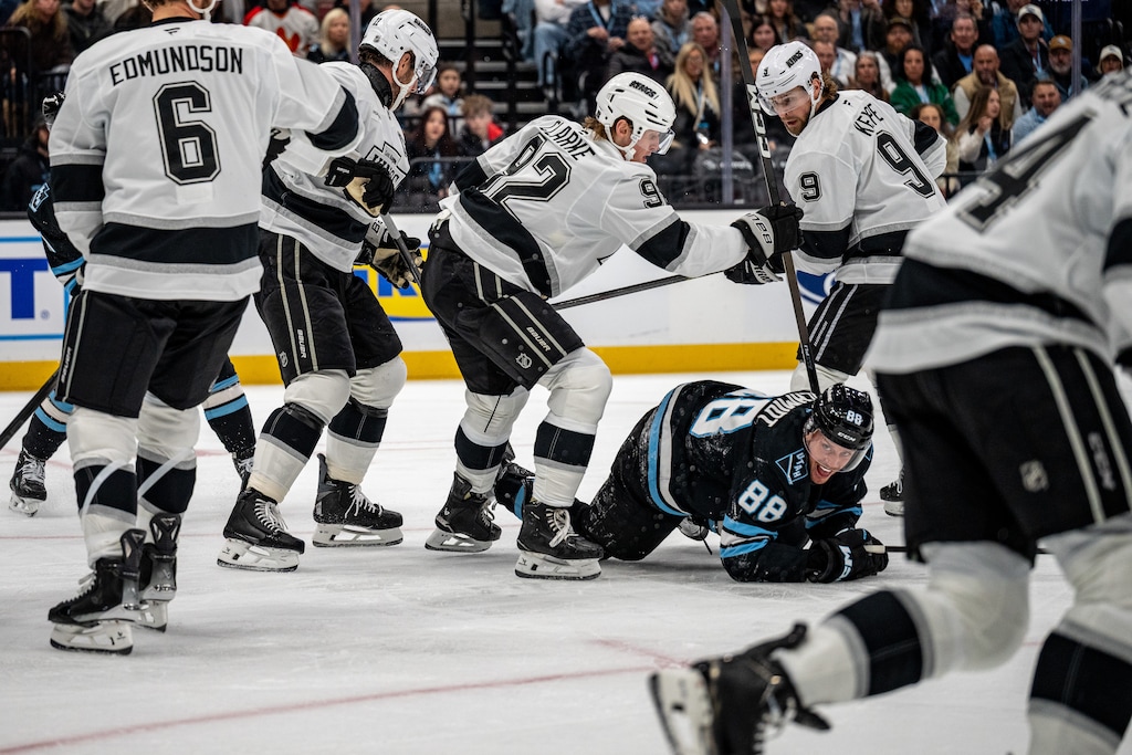 (Trent Nelson  |  The Salt Lake Tribune) Utah Mammoth defenseman Nate Schmidt (88) falls to the ice as the Utah Mammoth host the Los Angeles Kings.