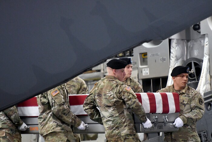 (Steve Ruark  |  AP Photo)  An Army carry team moves a transfer case containing the remains of Staff Sgt. Aaron R. Butler at Dover Air Force Base, Del., Friday, Aug. 18, 2017. According to the Department of Defense, Butler, 27, Monticello, Utah, died Aug. 16 in Nangarhar province, Afghanistan, of injuries sustained from an improvised explosive device while conducting combat operations. (AP Photo/Steve Ruark)