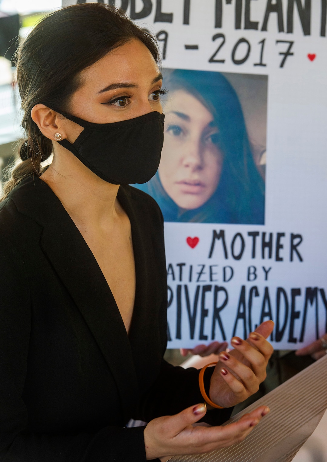 (Rick Egan  |  The Salt Lake Tribune)    Cassandra Hardin, talks about her experience at a residential treatment center, during a rally calling for the closure of Provo Canyon School, a residential treatment center in Utah she attended when she was a teen, on Friday, Oct. 9, 2020.