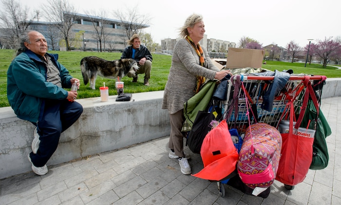 (Steve Griffin  |  The Salt Lake Tribune) Duane Valdez, left, joined Ronald Barrett Jr., and his wife Katherine Barrett they talked about being homeless and the difficultly they have trying to find a place to sleep, including on the grounds of the Salt Lake City Main Library, in Salt Lake City Monday April 16, 2018. 