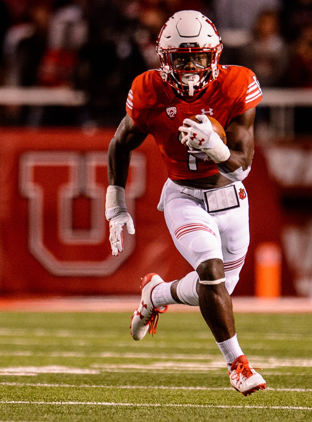 (Trent Nelson | The Salt Lake Tribune)  Utah Utes running back Devonta'e Henry-Cole (7) runs the ball as the University of Utah hosts Stanford, NCAA football at Rice-Eccles Stadium in Salt Lake City Saturday October 7, 2017.