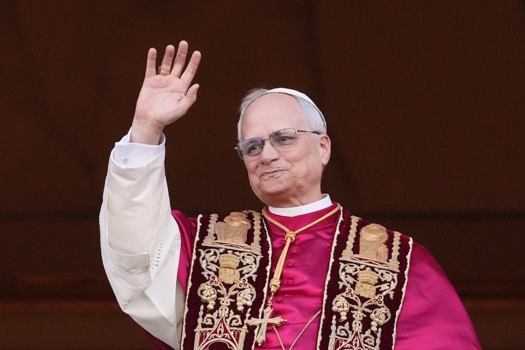 (Alessandra Tarantino | AP) Cardinal Robert Prevost appears on the central loggia of St. Peter's Basilica after being chosen the 267th pontiff of the Roman Catholic Church, choosing the name of Pope Leo XIV, at the Vatican on Thursday, May 8, 2025.