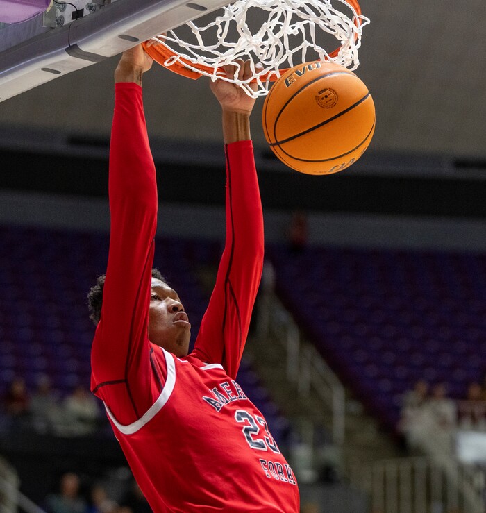 (Rick Egan | The Salt Lake Tribune) Kean Webb dunks the ball for the American Fork Cavemen, for  the Boys 6A State Championship at Weber State, on Saturday, March 4, 2023.