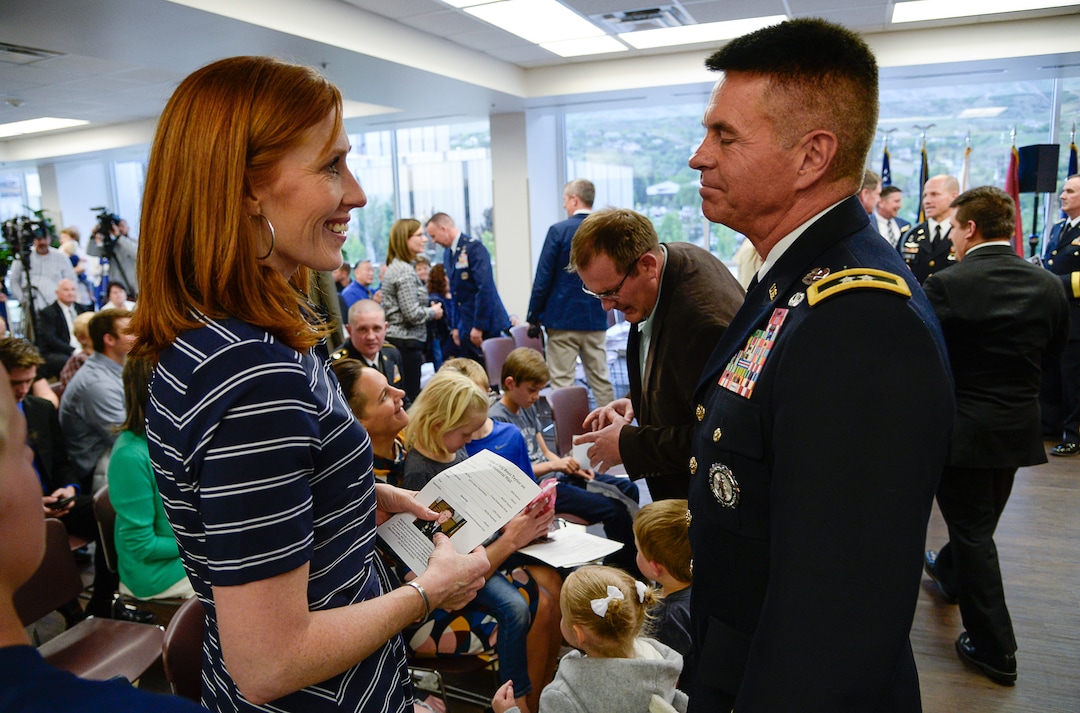 (Francisco Kjolseth  |  The Salt Lake Tribune)  Jennie Taylor speaks with Major General Jefferson Burton before Brigham Young University honored the life and legacy of Jennie's husband, Major Brent Taylor, former mayor of North Ogden and a BYU Army ROTC alumnus who died overseas in 2018, during a ceremony at the Wilkinson Student Center Reflection Room in Provo on Thursday, May 23, 2019.