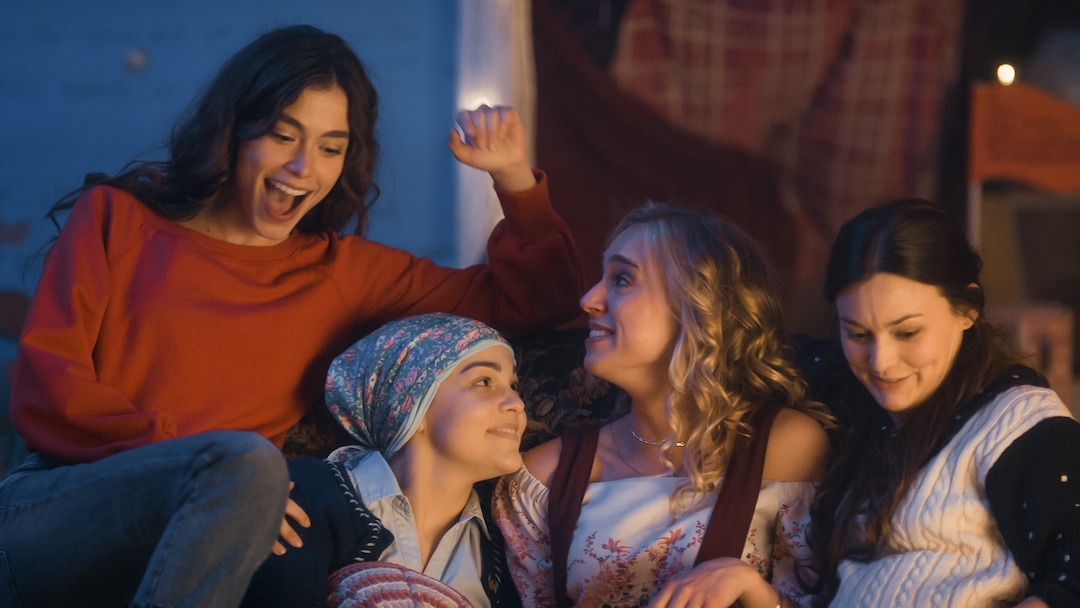 (Photo courtesy Pinnacle Peak Pictures) The March sisters — from left, Jo (Sarah Davenport), Beth (Allie Jennings), the adult Amy (Taylor Murphy) and Meg (Melanie Jones) — reminisce in a scene from director Clare Niederpruem's modern-day adaptation of Louisa May Alcott's "Little Women."
