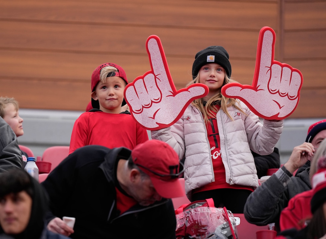 (Francisco Kjolseth | The Salt Lake Tribune) Young fans cheer on the University of Utah as they host the Colorado Buffaloes in Pac-12 football, Friday, Nov. 26, 2021 at Rice-Eccles Stadium.