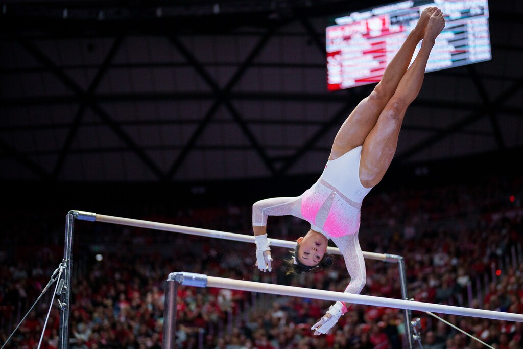 (Trent Nelson  |  The Salt Lake Tribune) Cristal Isa on the bars as Utah hosts California, NCAA gymnastics in Salt Lake City on Friday, Feb. 24, 2023.