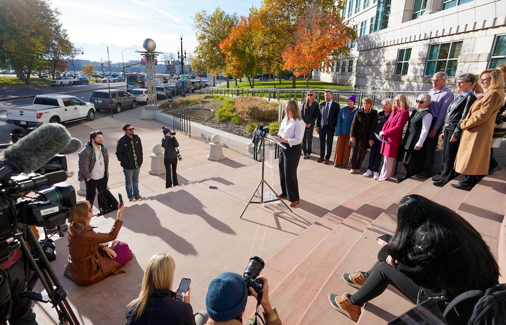 (Chris Samuels | The Salt Lake Tribune) Elizabeth Rasmussen speaks as plaintiffs from a redistricting lawsuit hold a news conference outside Third District Court in Salt Lake City, Tuesday, Nov. 11, 2025. A judge selected a map proposed by the plaintiffs to be the 2026 congressional boundaries.
