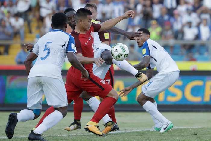 United States' Bobby Wood, 9, controls the ball before scoring his team's first goal during a 2018 World Cup qualifying soccer match against Honduras in San Pedro Sula, Honduras, Tuesday, Sept. 5, 2017. (AP Photo/Rebecca Blackwell)