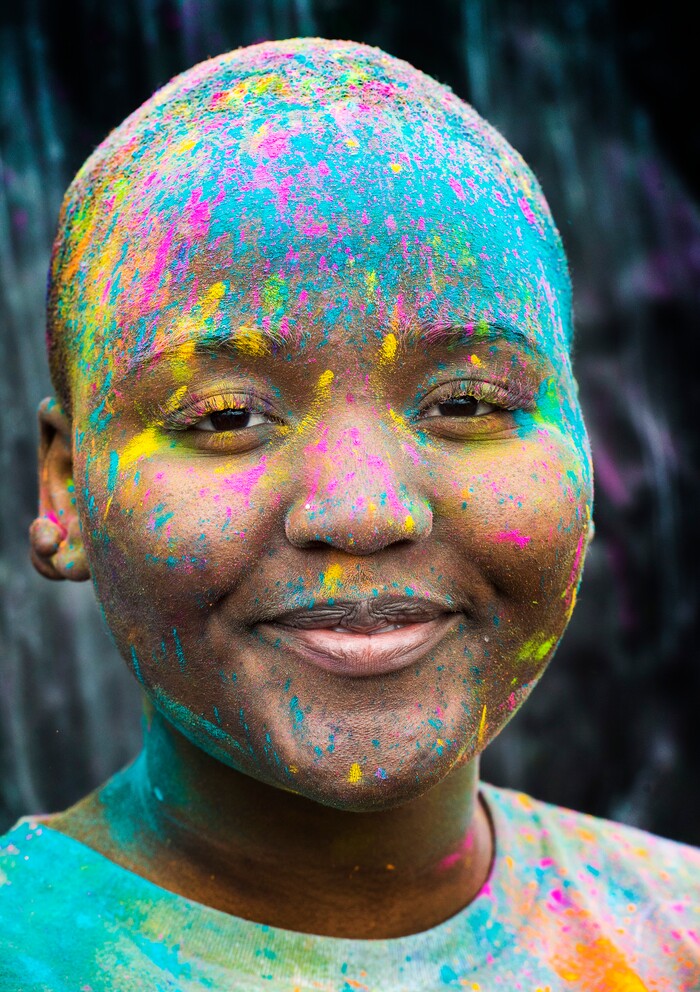 (Rick Egan  |  The Salt Lake Tribune)   
Vainia, takes a break from the crowd, at the Holi Festival of Colors celebration at the Sri Sri Radha Krishna Temple in Spanish Fork, Saturday, March 30, 2019.

